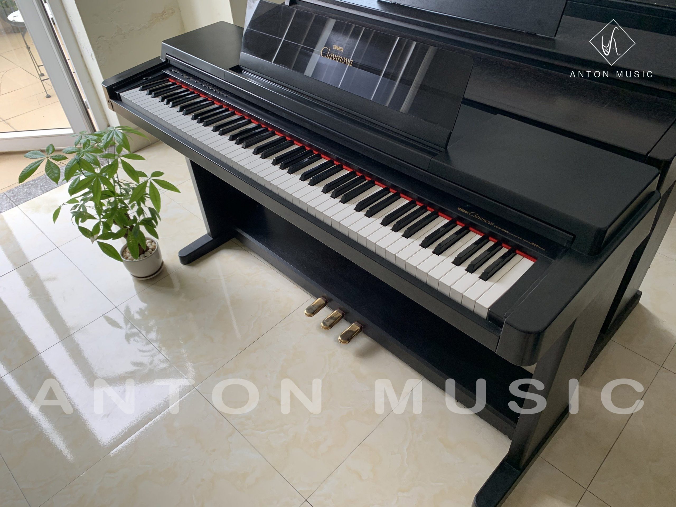 Piano Yamaha CLP 560